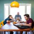 patient parents at a table